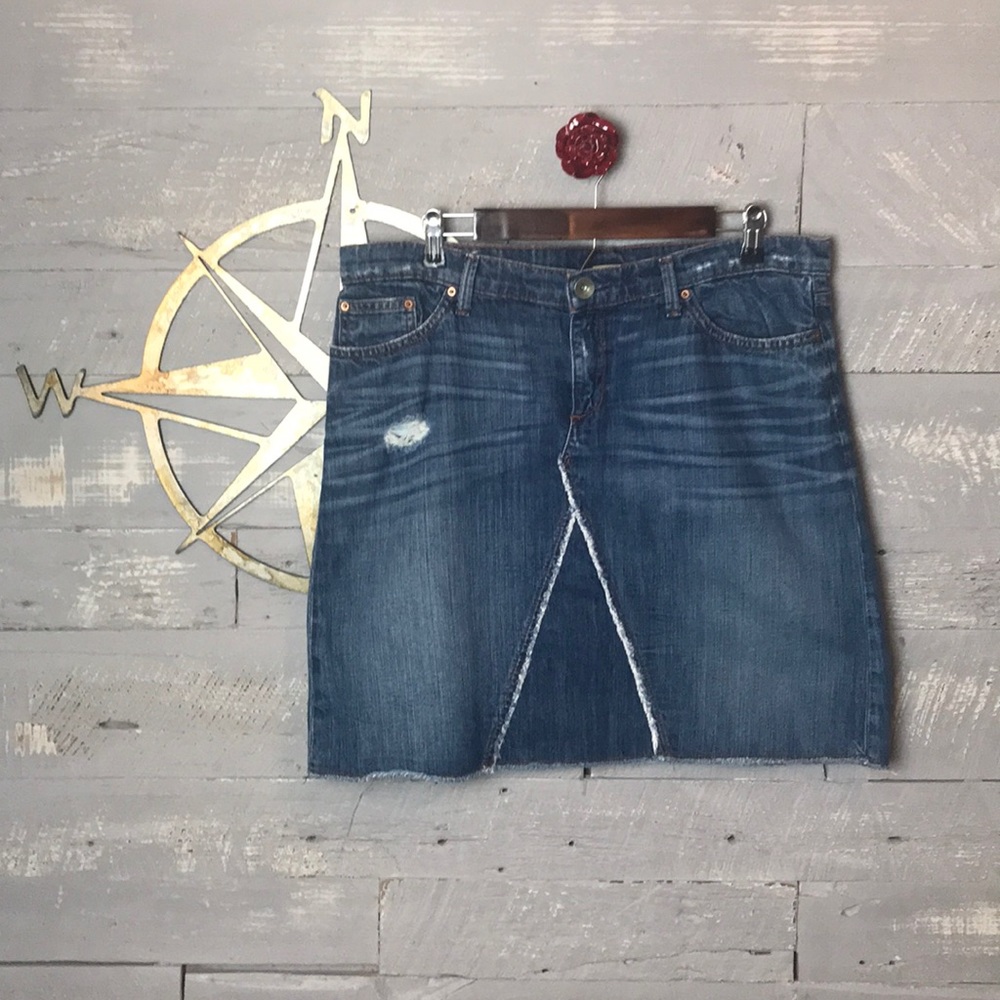 Super cute distressed denim skirt